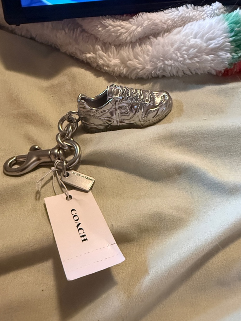 Coach Metallic Silver Sneaker Key Charm